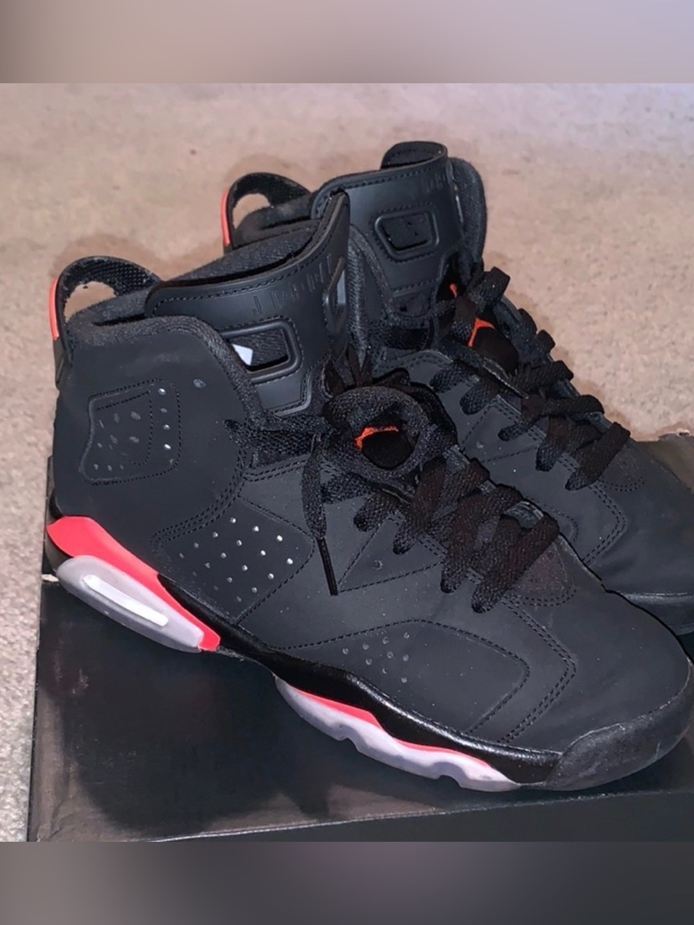 Jordan Black and Orange Sneakers